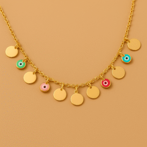 Gold necklace with colorful enamel charms and polished round discs on golden background by H&A Jeweller