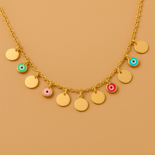 Gold necklace with colorful enamel charms and polished round discs on golden background by H&A Jeweller