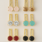 Set of six gold stud earrings with colorful round stones and crystal detailing by H&A Jeweller