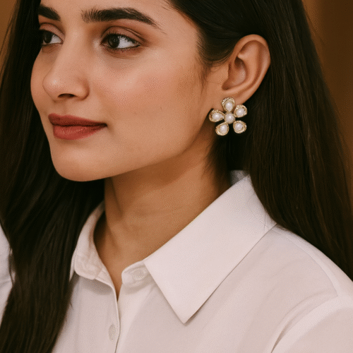 "Luxury gold floral earrings with luminous pearl accents by H&A Jeweller"