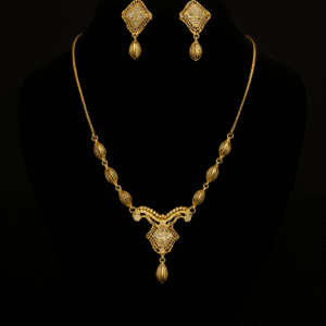 One carat gold jewelry set by H&A featuring intricate necklace and matching earrings on black background
