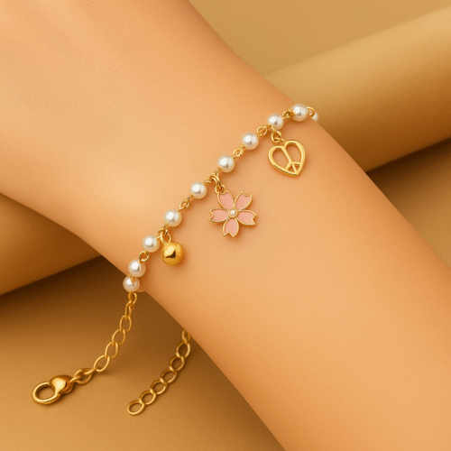 Golden Pearl Bracelet with Flower and Heart Charms – H&A Jewelry